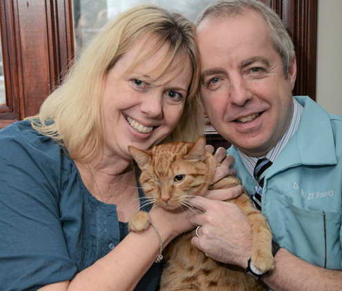 Dr_Brian_Rooney_and_Karen_Rooney_with_their_late_cat_Pierre-Courtesy_of_Burr_Ridge_Veterinary_Clinic.jpg
