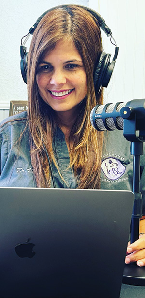 Mitsie Vargas, DVM recording a podcast