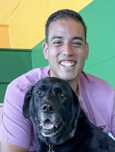 Marcus Dela Cruz, DVM and his dog Charlie