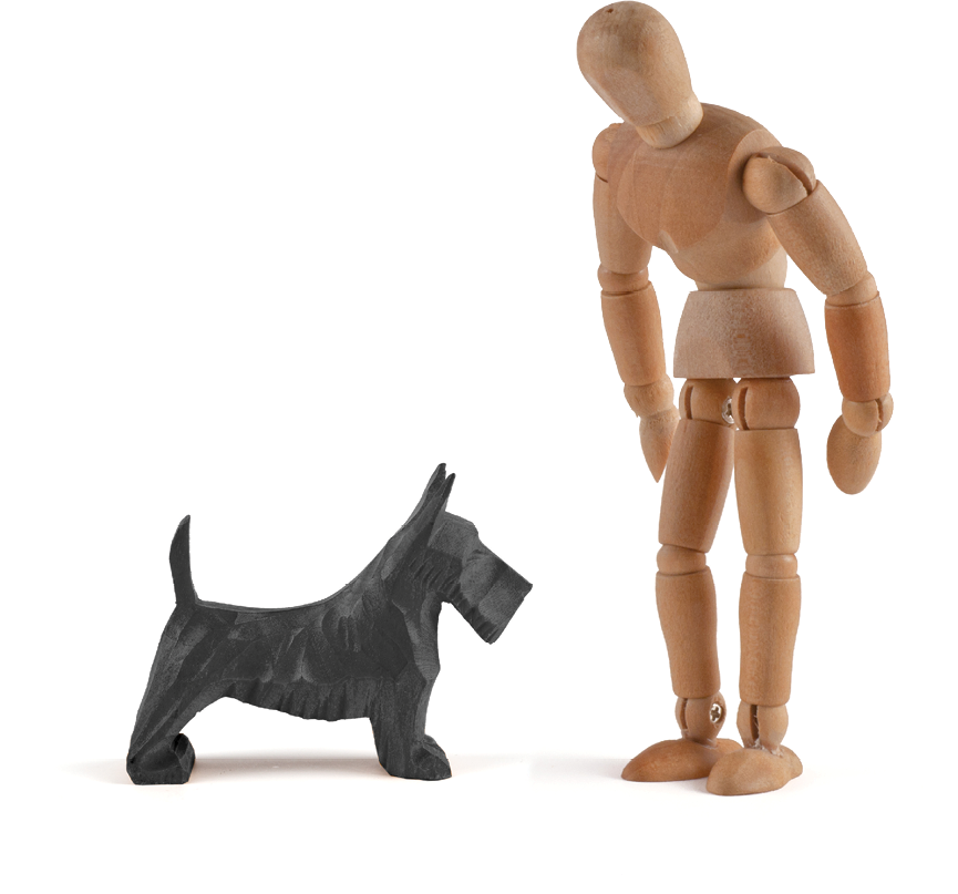 Wooden mannequin and dog