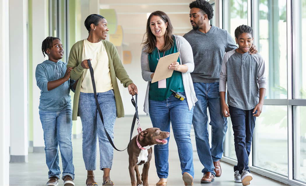 Family adopting dog