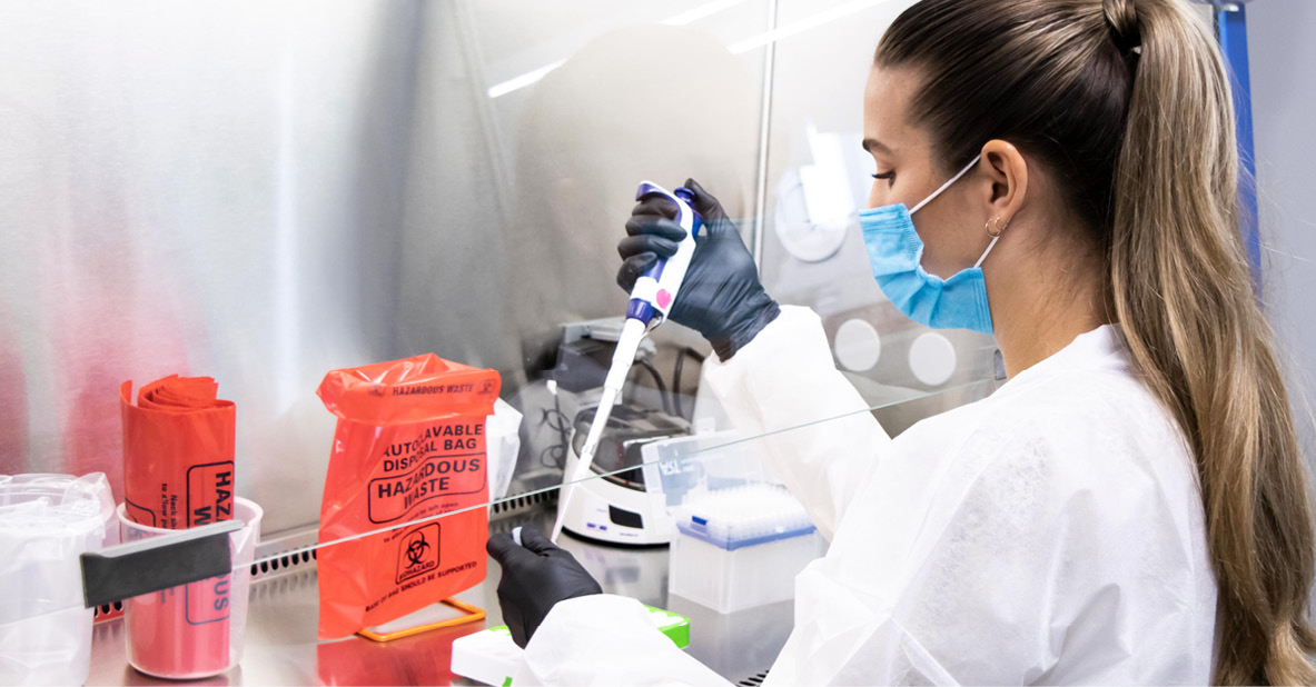 Lab technician working with a liquid biopsy blood sample