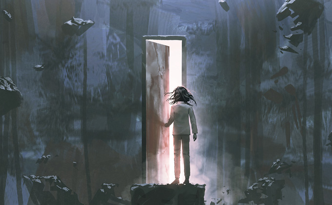 Person in a dark place opening a door to bright light