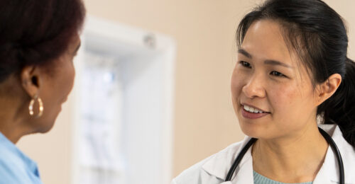 A veterinarian engaging her client by telling a story