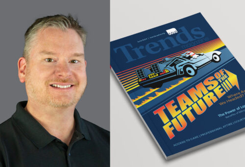 Photo of Trends editor, Ben Williams, next to a July 2024 Trends print magazine