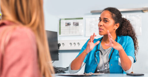 Technician going over treatment options with her client