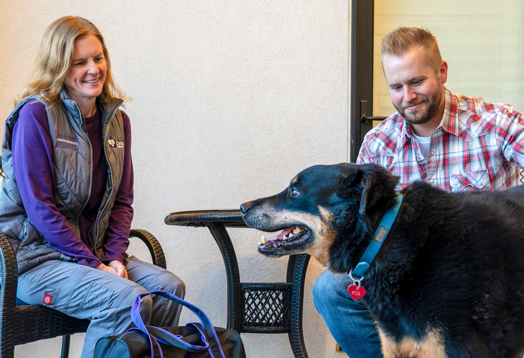 Gina Singleton, DVM, works with clients during a hospice and palliative care visit.
