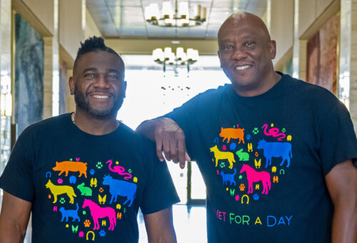 Critter Fixers stars Vernard Hodges, DVM, (left) and Terrence Ferguson, DVM. Both are wearing t-shirts that say 