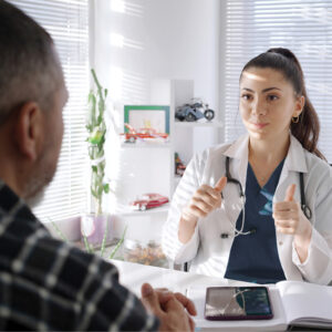 female veterinarian explaining something to a client