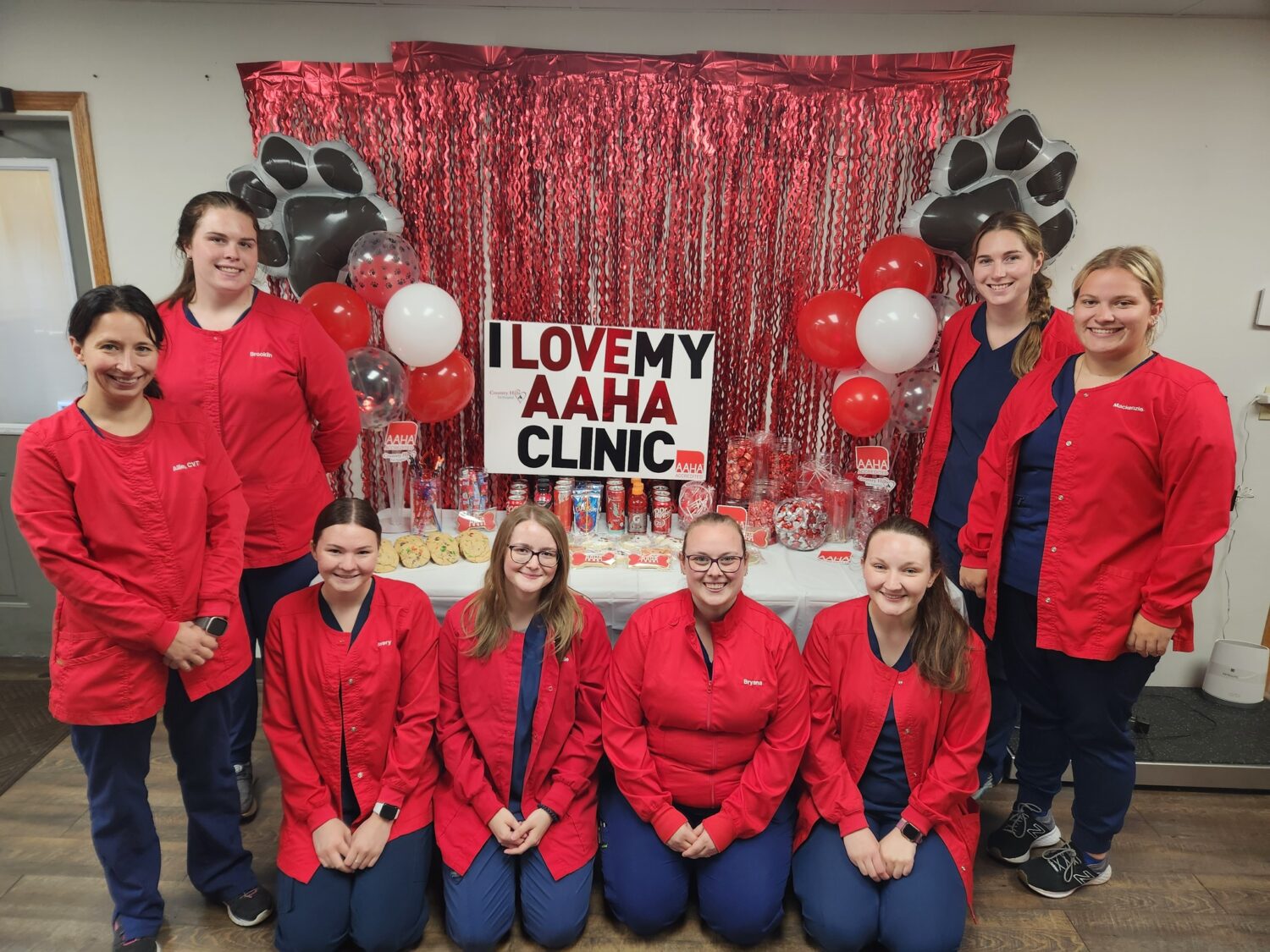 Veterinary staff celebrating AAHA Accreditation
