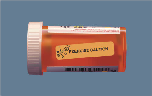 a prescription bottle with a warning label that reads 