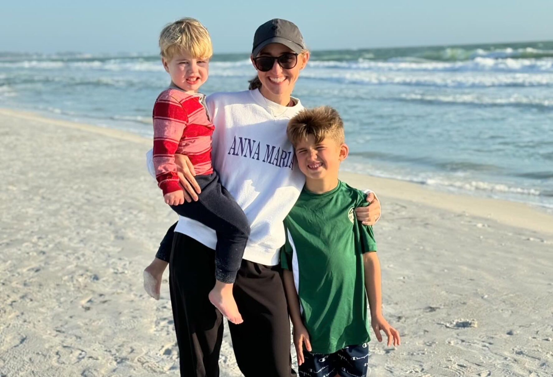 Mom and two boys at beach