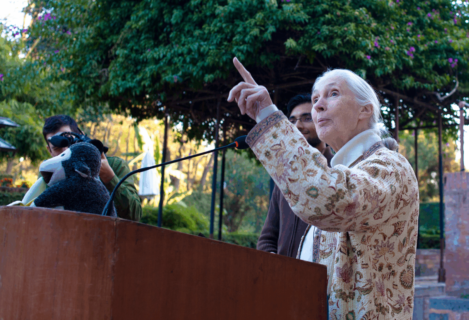 Jane Goodall speaking at a podium