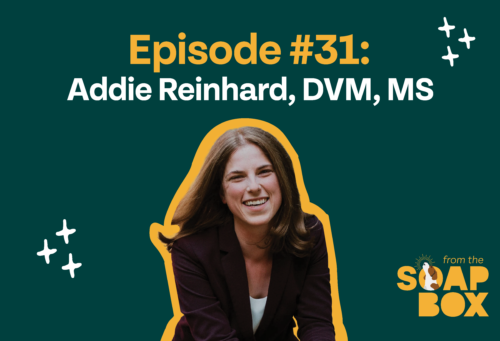 Photo of Addie Reinhard on a dark green background