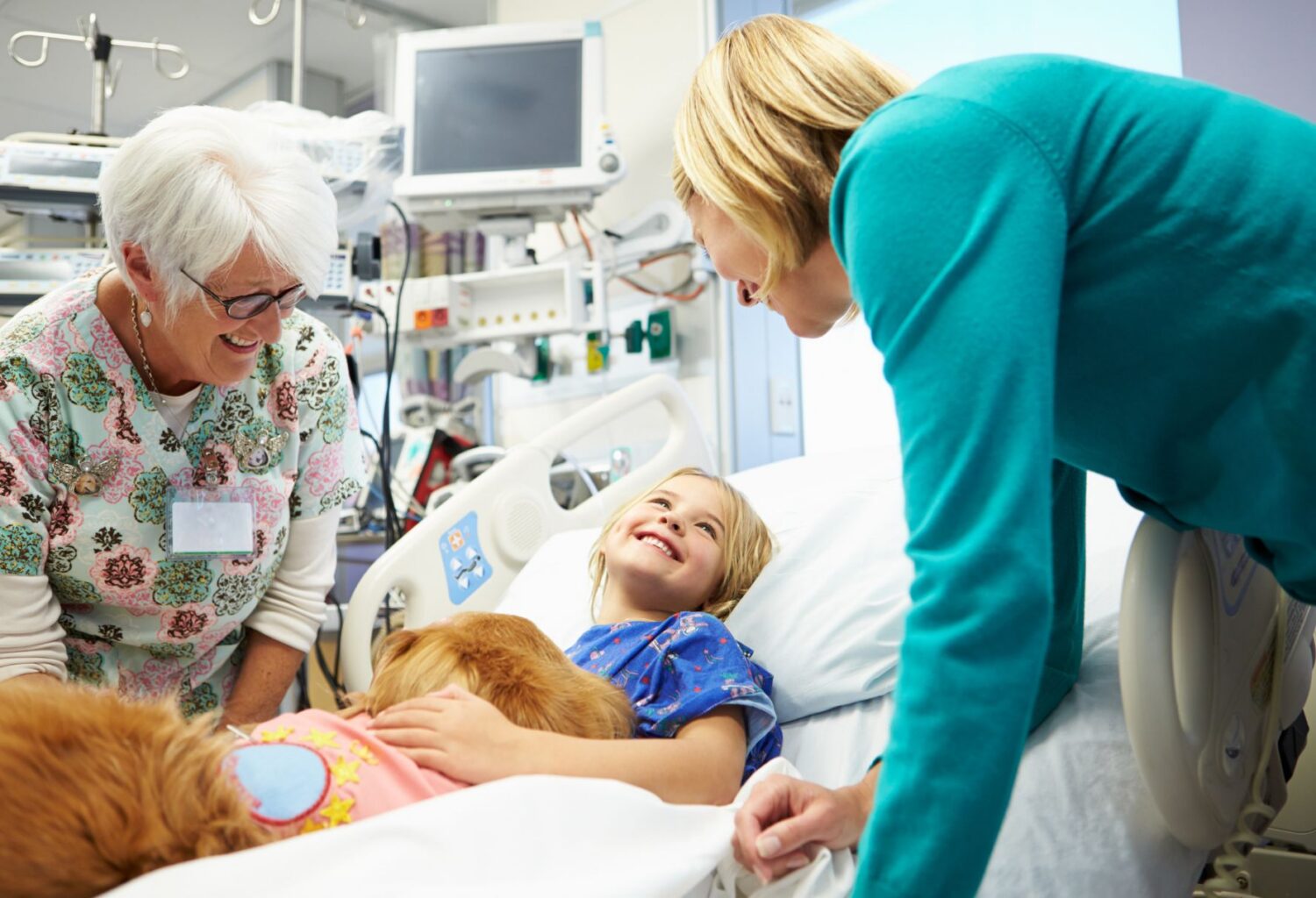 therapy dog with child in hospital